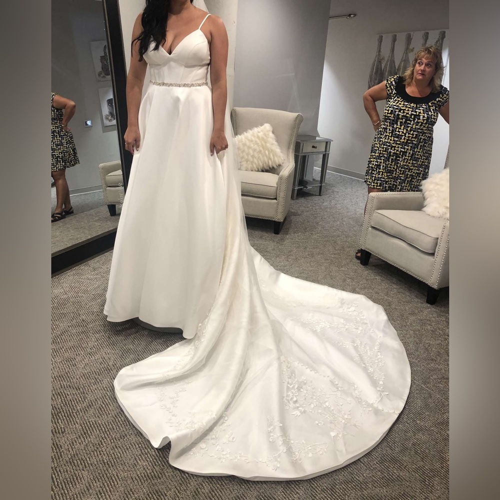 Martina Liana dress with belt, pockets, and beautiful button details